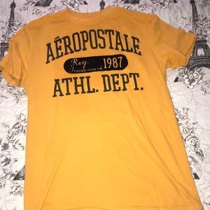 A yellow Aéropostale shirt